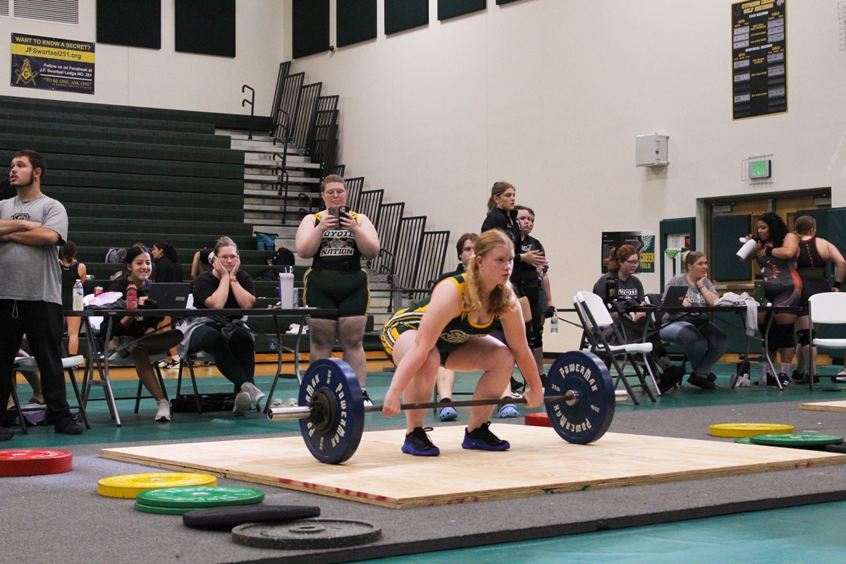 The+Cypress+Creek+gymnasium+was+rattling+with+excitement.+Cypress+Creek+Weightlifter%2C+freshman%2C+Sarah+MacMullan%2C+attempts+a+snatch+at+120+pounds.+%E2%80%9CI+felt+confident+in+lifting+this+weight+because+I+have+performed+it+before.%E2%80%9D+MacMullan+finishes+first+in+her+weight+class+winning+districts.++
