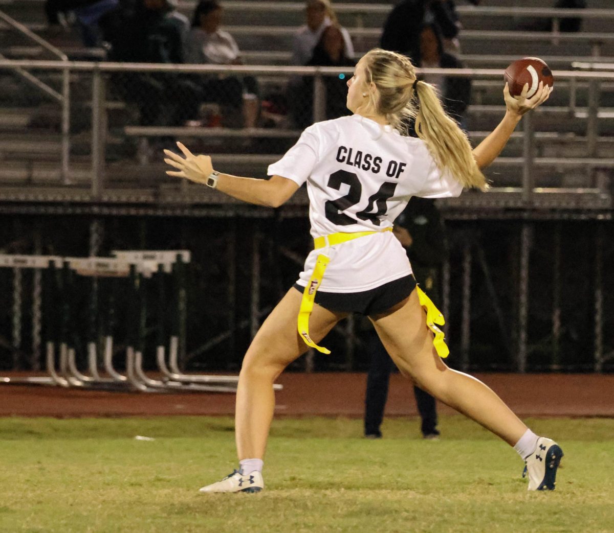 The senior quarterback taking a shot downfield at an open receiver.