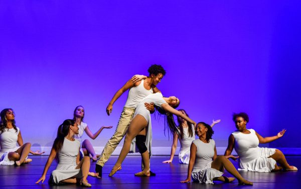 The blue hue creates a winter compliment as the CCHS dancers express themselves during the winter showcase at the IPAC.