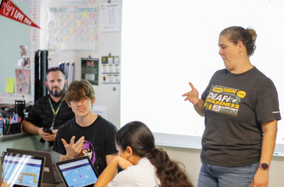 “Deaf Awareness”. In ASL classroom Deaf student Jamon Kisler is included with all of his classmates in his ASL 1 Class with his enterpator.   