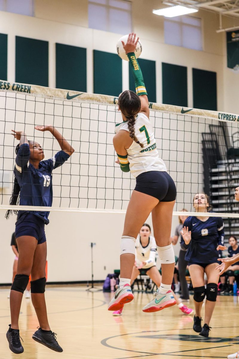 The Spike. Addison Wilkes, a freshman on Cypress Creek volleyball spikes the ball on her opponents, Angelene Academy. As the ball whistled through the air, it smacked the ground, scoring the Creek a point. Wilkes had an exceptional performance in this game, which influenced Cypress to take the Win.  “I was nervous because I wanted to do well and show my team that just because I’m young I’m not any less. I was very proud of myself for how I played that game, and it was a highlight of my season.” Said freshman Addison Wilkes.  