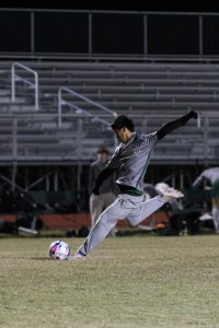 Freshman Jadyen Tran on fire. Tran is making moves with the ball, showing the upperclassmen what he’s got during the game against Lakewood ranch. “When I was dribbling the ball, I felt like all the pressure was on me.” said Tran 