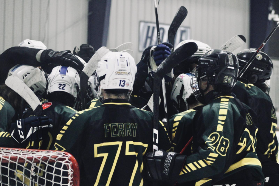 The CCHS hockey team had just won their game against Land o' Lakes high school. It was a close game but they persevered and communicated and ended up winning the close game. 